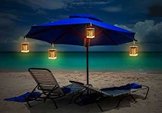Flickering Solar Lanterns with Clips Attached to Patio Umbrella