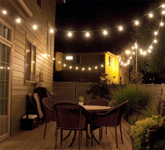 Solar Bistro Lights Strung Across Backyard Patio